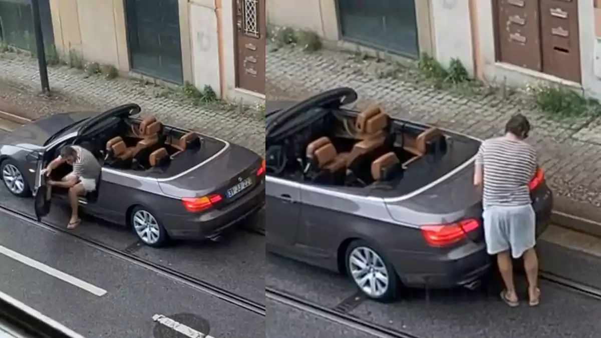 Dono de BMW descapotável no Porto desespera por fechar capota enquanto carro enche de água de chuva repentina